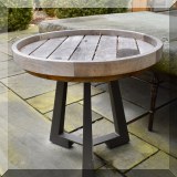 L05. 2 Metal and wood round side tables. 24”h x 25”w 